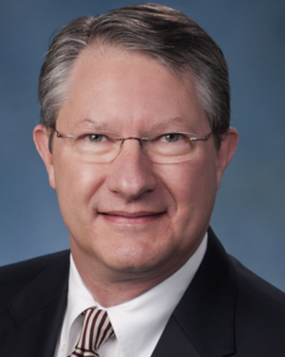 A traditional portrait photo of John Baas